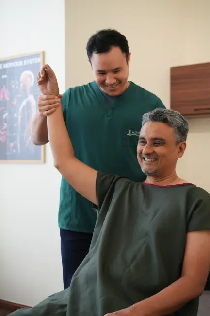 Patient receiving spinal adjustment